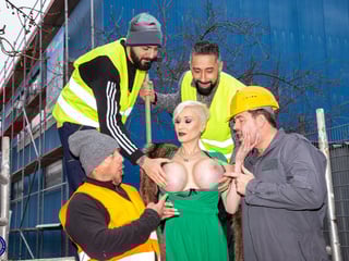 Fake titted MILF Tanya Virago coming for a hard gangbang