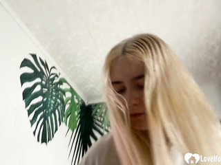 Blonde hottie is on her knees and giving a blowjob