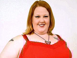 Fat Brunette Sizes Up the Cock