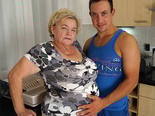 Curvy granny sucking and fucking a way younger dude in her kitchen