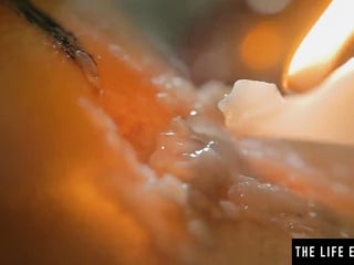 THE LIFE EROTIC Sexy brunette squirting as she fucks herself with a lit candle