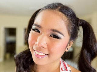 Asian cutie Kandi goes down to polish rock hard pecker