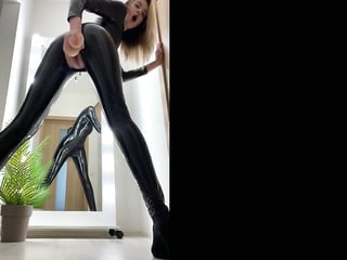 Babe in a tight outfit does some teasing