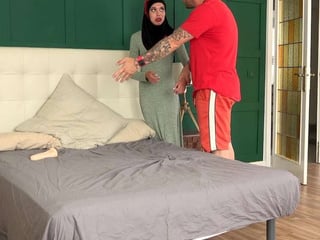 A woman in hijab needs to use both holes