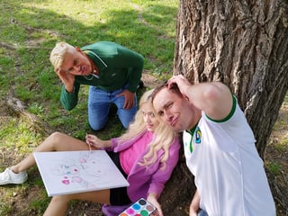 Kira Queen's friend paints while she flashes