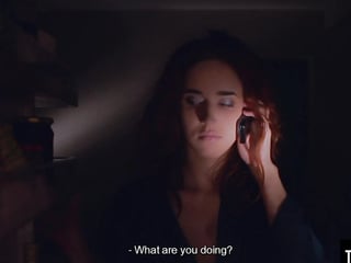 Lustful redhead Emily J is fingering her holes on the couch