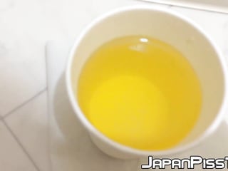 Kinky chick from Japan keeps track of how much she can pee