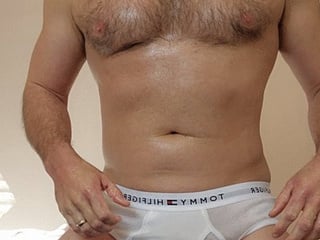 Big white dick drenched in oil and cumming