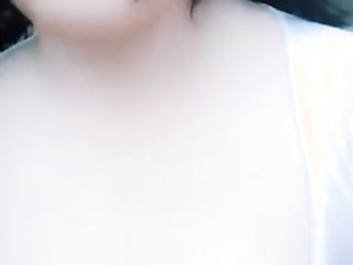 Asian Ladyboy in publish flashing her cock and masturbating it
